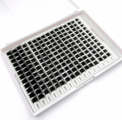 Product photograph by SIELO BEAUTY showing a white tray filled with organized black pre-made volume eyelash extension fans, categorized by lengths from 8mm to 16mm, with Short So Dreamy printed on the side